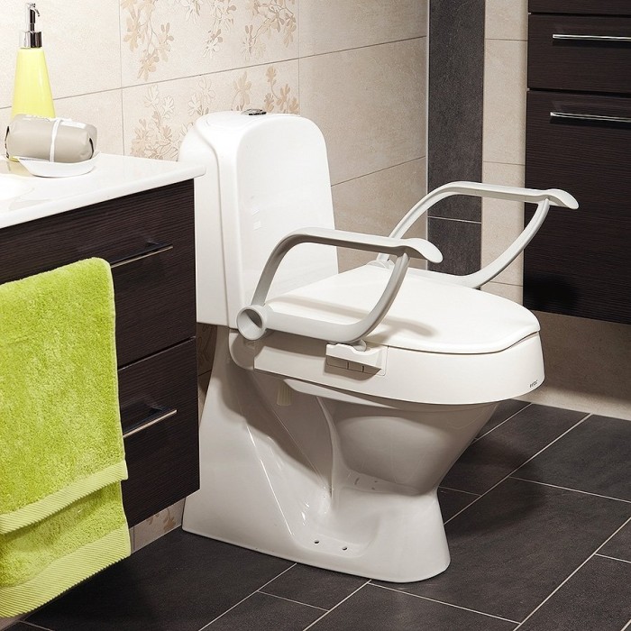 Rehausseur de toilettes réglable