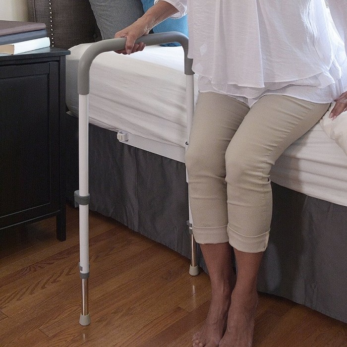 Barre de maintien rotative pour lit